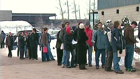 Job seekers line up outside Canadian Solar Solutions new plant in Guelph, Ont. on Friday, Feb. 11, 2011.