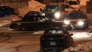 Police investigate after a man was found with at least one gunshot wound in Toronto's west end, early Friday, Feb. 11, 2011. (Tom Stefanac / CTV News)