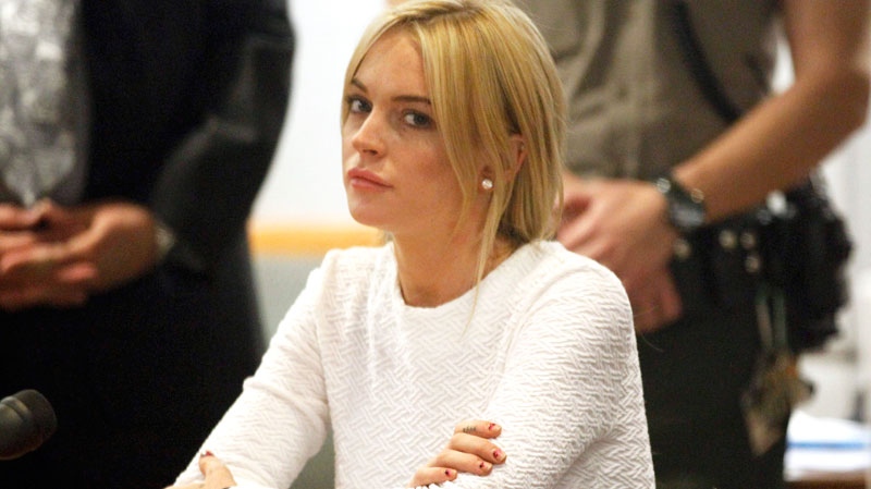 Actress Lindsay Lohan appears in court during her arraignment on a felony grand theft charge at the LAX Airport Courthouse in Los Angeles, Wednesday, Feb. 9, 2011. (AP / Mario Anzuoni)