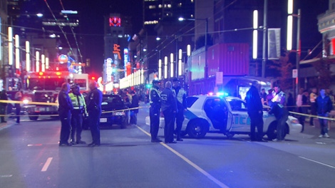 Vancouver police cordon off an area of Granville Street early Sunday morning after a shooting in front of the Barcelona Lounge nightclub. Feb. 13, 2011. (CTV)