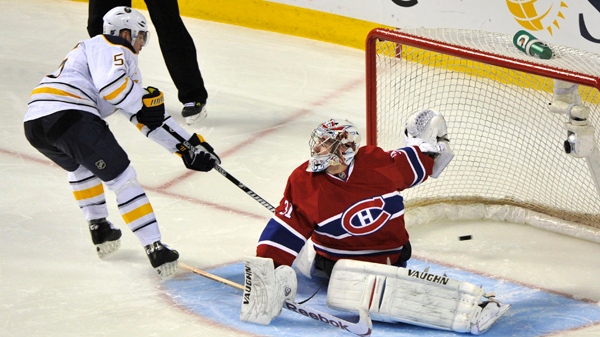 Buffalo Sabres' Jochen Hecht scores his winning goal in the shootout past Montreal Canadiens goalie Carey Price during NHL hockey action Tuesday, February 15, 2011 in Montreal. The Sabres beat the Canadiens 3-2. THE CANADIAN PRESS/Paul Chiasson