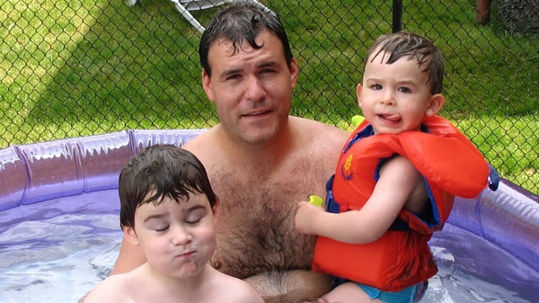 Stephen Watkins and his sons Alexander (left) and Christopher are shown in a family handout photo. (THE CANADIAN PRESS / HO-Stephen Watkins)