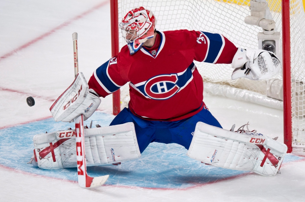 Montreal Canadiens goalie Carey Price deflects a s