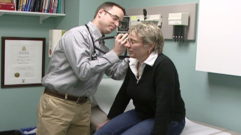 Family physician Dr. Craig Albrecht meets with a patient in Waterloo Region.