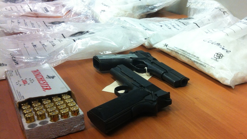 700 thousand dollars in cocaine and other drugs, along with a cache of guns were also seized  