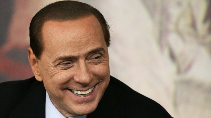 Italian Premier Silvio Berlusconi smiles during a press conference at Chigi Premier's palace, in Rome, Wednesday, Feb. 16, 2011. (AP Photo/Riccardo De Luca)
