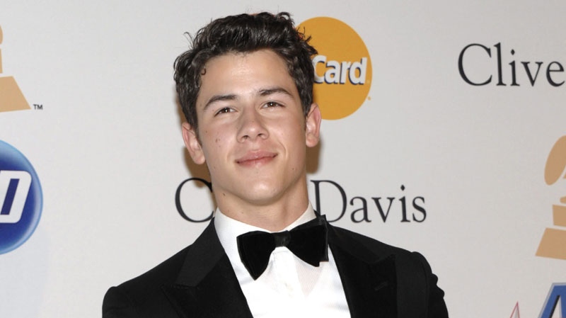 Nick Jonas arrives at the Pre-Grammy Gala & Salute to Industry Icons with Clive Davis honoring David Geffen on Saturday, Feb. 12, 2011 in Beverly Hills, Calif. (AP Photo/Dan Steinberg)