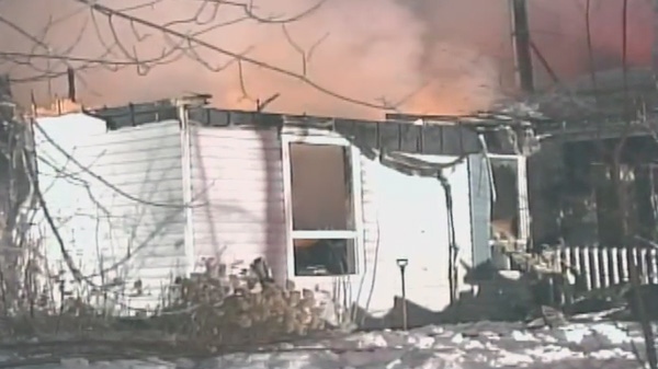 A fire destroyed this L'Ange Gardien home Tuesday, February 15, 2011. Image courtesy TVA. 