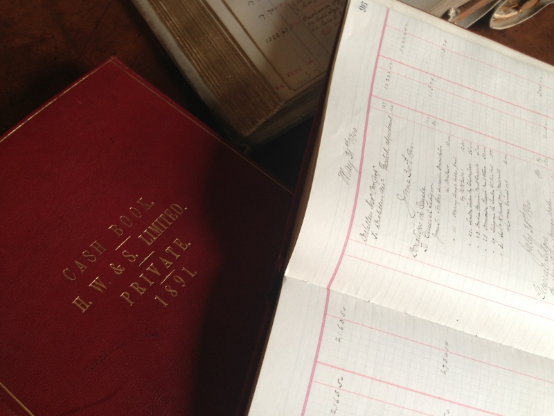 When it bought Hiram Walker & Sons, Beam Global found dozens of company ledgers stored in an archive room in the basement. These are from the 1890’s and they sit open on Hiram Walkers' desk. (Michelle Maluske / CTV Windsor)