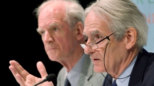 Philosopher Charles Taylor, left, and sociologist Gerard Bouchard speak to the media after releasing their report in Montreal Thursday, May 22, 2008 . (Ryan Remiorz / THE CANADIAN PRESS)