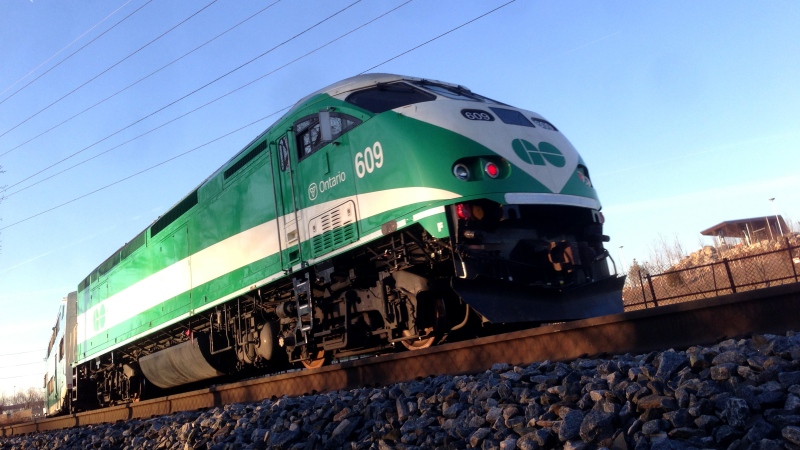 A GO Train passes along a stretch of tracks alongside the Don Valley Parkway in Toronto on Friday, April 5, 2013. (CTV Toronto/Maurice Cacho)