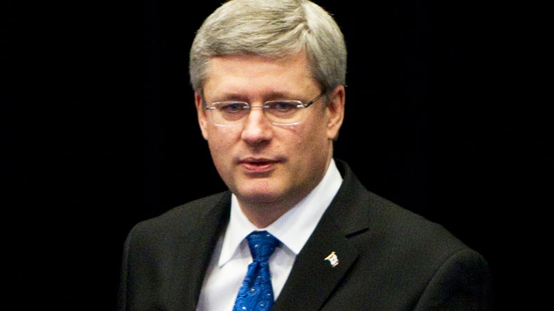 Prime Minister Stephen Harper arrives to speak in Vancouver on  Monday, Feb. 21, 2011. (Jonathan Hayward / THE CANADIAN PRESS)