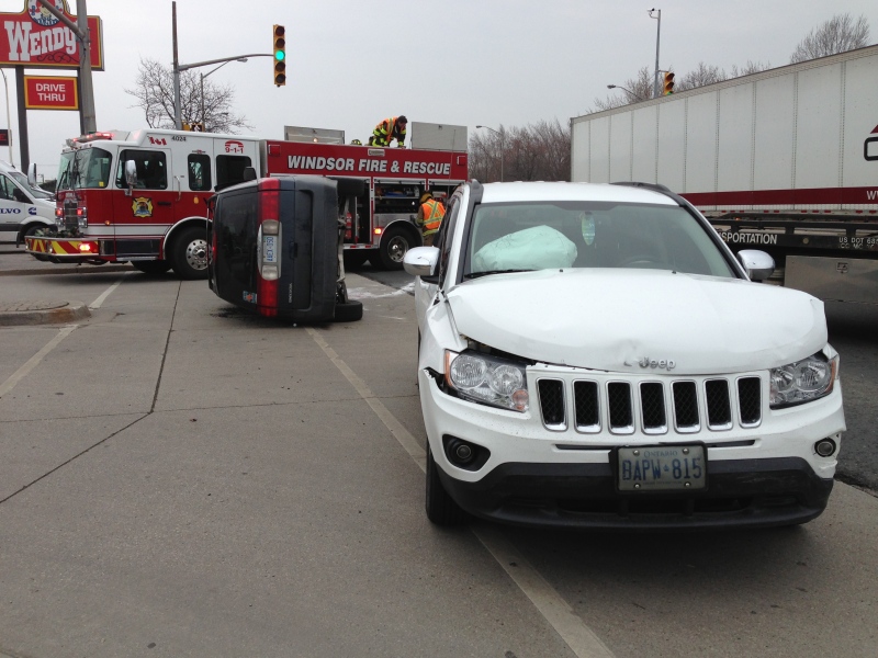 Emergency crews are at the scene of a two-vehicle crash on Huron Church Road in Windsor, Ont., Tuesday, April 9, 2013. (Michelle Maluske / CTV Windsor)