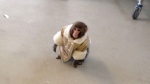 In this 2012 file photo, Darwin, a small monkey wearing a winter coat and a diaper, is shown in Ikea. (Bronwyn Page)