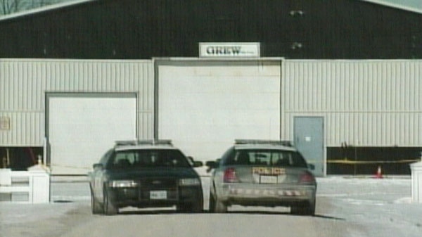 Grey County OPP cruisers are seen outside Grew Boats Manufacturing, where a man was shot, in Georgian Bluffs Township, Ont. on Tuesday, Feb. 22, 2011.