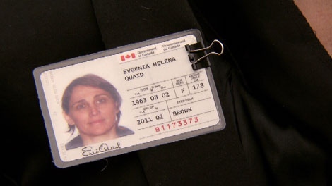 Evi Quaid's Canadian citizenship card is seen pinned to her lapel during a Vancouver press conference on Feb. 23, 2011. (CTV)