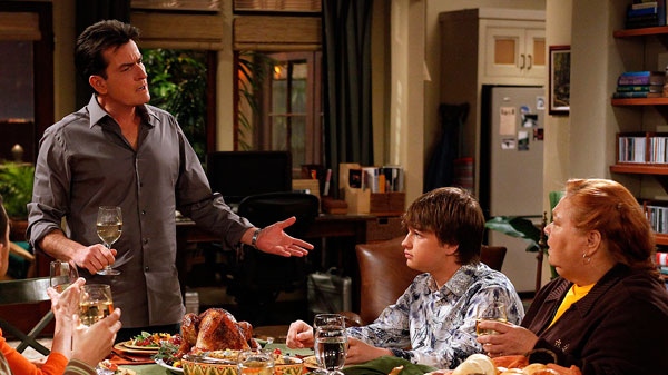 In this undated publicity image released by CBS, from left, Charlie Sheen, Angus T. Jones and Conchata Ferrell are shown during the taping of 'Two and a Half Men,' in Los Angeles. (AP / CBS, Greg Gayne)