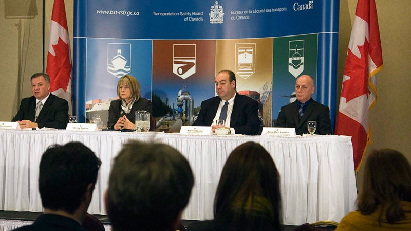 Transportation Safety Board of Canada officials Mike Cunningham, Wendy Tadros, Mark Clitsome and Jean-Marc Ledoux, left to right, hold a news conference after releasing the final report into the fatal 2009 crash of Cougar Flight 91, in St. John's, N.L. on Wednesday, Feb. 9, 2011. (Canadian Press / Andrew Vaughan)
