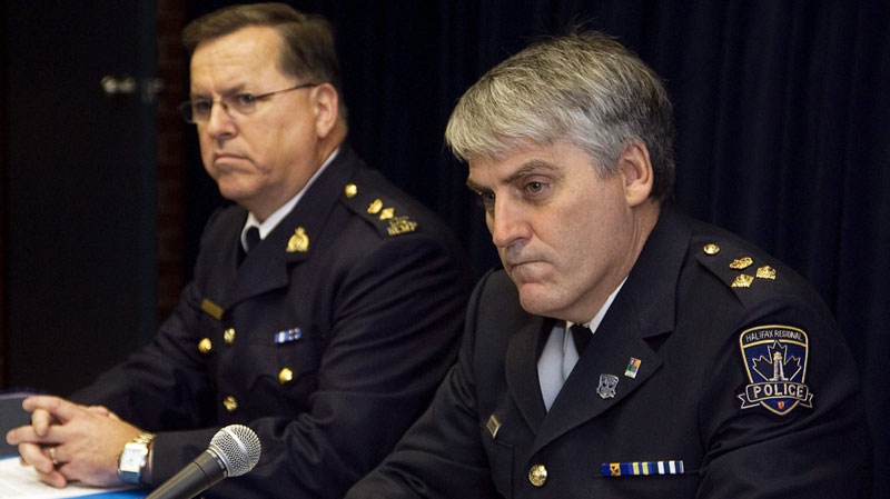 Deputy Chief Chris McNeil, right, of the Halifax Regional Police, and RCMP Supt. Darrell Beaton field questions at a news conference in Halifax on Wednesday, Oct. 27, 2010. (THE CANADIAN PRESS/Andrew Vaughan)