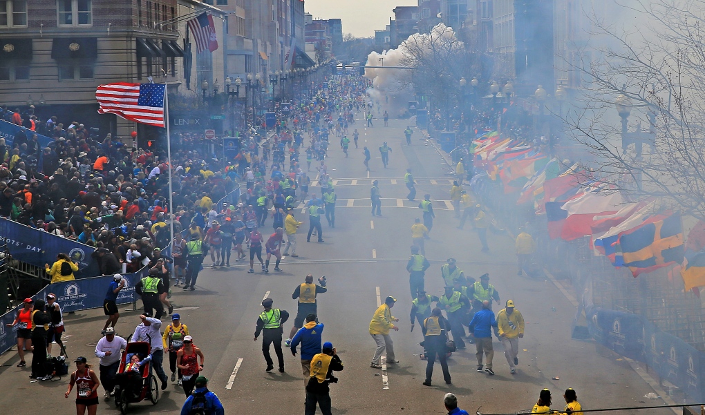 People run from explosion at Boston Marathon