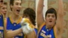 A home video still shows Eric Stitzenberger and his teammates celebrating a win that went beyond the scoreboard.