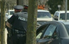 Police officers are seen near Highland Road and Belmont Avenue in Kitchener, Ont., on Wednesday, April 17, 2013. (CTV Kitchener)