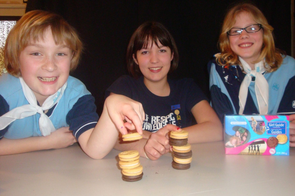 Posing with Girl Guide cookies