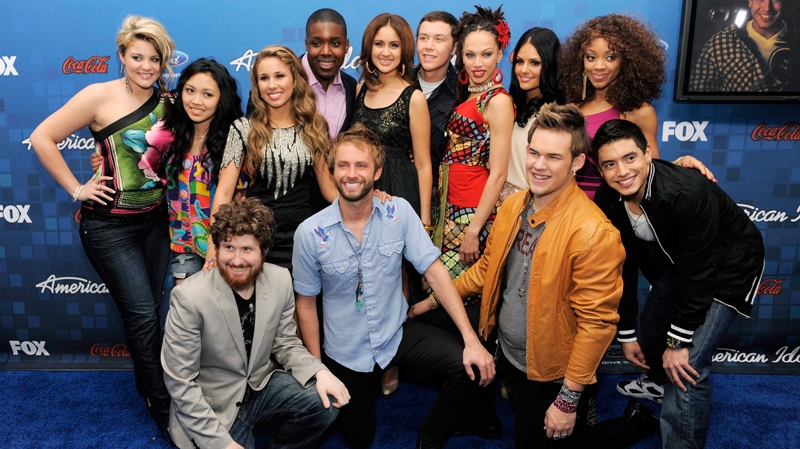 'American Idol' finalists pose together at the 'American Idol' Finalists Party in Los Angeles, Thursday, March 3, 2011. In the front row from left to right are Casey Abrams, Paul McDonald, James Durbin and Stefano Langone. In the back row from left to right are Lauren Alaina, Thia Megia, Haley Reinhart, Jacob Lusk, Karen Rodriguez, Scotty McCreery, Naima Adedapo, Pia Toscano and Ashthon Jones. (AP / Chris Pizzello)