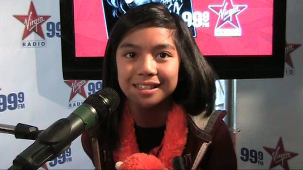Young Winnipeg singer Maria Aragon sings on a radio program in Toronto Thursday March 3, 2011. (THE CANADIAN PRESS/ Michael Oliveira)