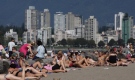 National Geographic just named Vancouver as one of the Top 10 beach cities in the world, along with Rio de Janeiro, Sydney, and Miami Beach. People pack Kitsilano Beach. (THE CANADIAN PRESS)