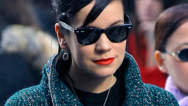 British singer Lily Allen poses for photographers prior to Chanel's Fall-Winter ready-to-wear 2012 collection, in Paris, Tuesday, March 8, 2011. (AP / Jacques Brinon)