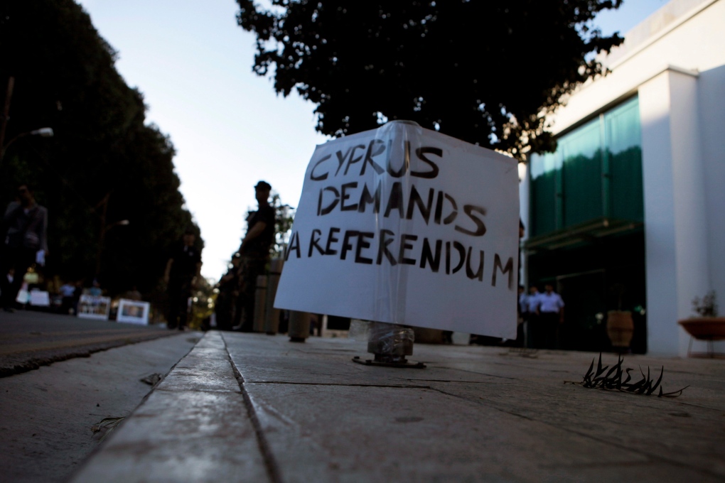 Cyprus bailout protest sign