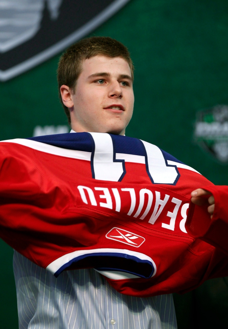Montreal Canadiens' draft pick, Nathan Beaulieu and his father Jacques, a former Ontario Hockey League coach, plead guilty to assault.

