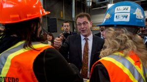 B.C. NDP leader Adrian Dix greets people during a campaign stop at the College of New Caledonia in Prince George, B.C. Tuesday, April 30, 2013. (THE CANADIAN PRESS/Jonathan Hayward)