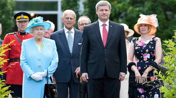 Queen Elizabeth, the Duke of Edinburgh, Prime Minister Stephen Harper and his wife Laureen arrive at a garden party at Rideau Hall in Ottawa, Wednesday June 30, 2010. (Adrian Wyld / THE CANADIAN PRESS)