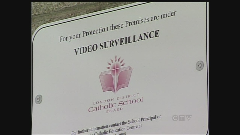A sign warns of video surveillance, just one of the security measures in place at London District Catholic School Board schools.