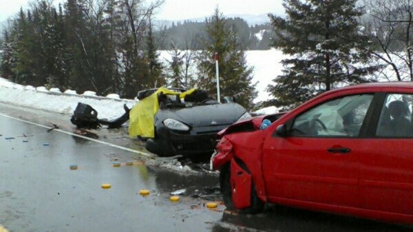 Two people were killed and two others were injured in a horrific head-on collision near Wakefield, Thursday, March 10, 2011.