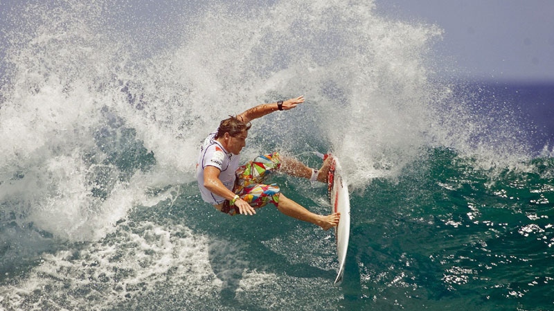 In this image released by the Association of Surfing Professionals, Mitch Coleborn, of Australia, cuts back on a wave during Round 6 of the SriLankan Airlines Pro surfing tournament Thursday, June 12, 2008 at Pasta Point, Maldives. (AP Photo/ASP, Steve Robertson, Covered Images) 