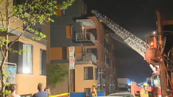A four-alarm fire broke out in the St-Ambroise are