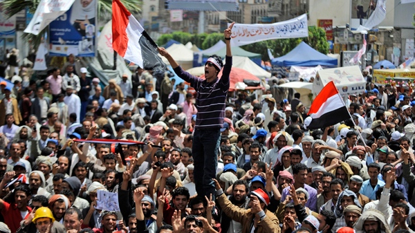 Anti-government protestors chant slogans during a demonstration demanding the resignation of Yemeni President Ali Abdullah Saleh, in Sanaa, Yemen, Monday, March 14, 2011. (AP / Hani Mohammed)