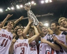 The Carleton Ravens  celebrate their 82-59 victory with the W.P. McGee trophy with their win over the Trinity Western Spartans in the CIS Final 8 men's basketball championship game in Halifax on Sunday, March 13, 2011.THE CANADIAN PRESS/Andrew Vaughan