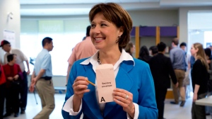 BC Liberal leader Christy Clark prepares to cast her ballot during advanced voting in Burnaby, B.C. Wednesday, May 8, 2013. British Columbians will go to the polls May 14th. THE CANADIAN PRESS/Jonathan Hayward