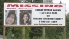 A sign near Maniwaki showing the pictures of Maisy Odjick and Shannon Alexander.