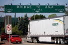 Traffic makes its way to Ambassador Bridge that connects Canada to the United States Windsor Ont. on Friday June 15, 2012. THE CANADIAN PRESS/Mark Spowart