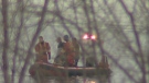 Rescuers scour the South Saskatchewan River for a woman who jumped off the University Bridge on Tuesday night.