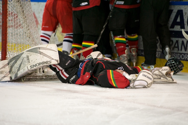 Kanata Stallions goaltender was knocked down by a hit from a Cornwall Colts hockey player during a playoff game in Cornwall, Sunday, March 13, 2011. 