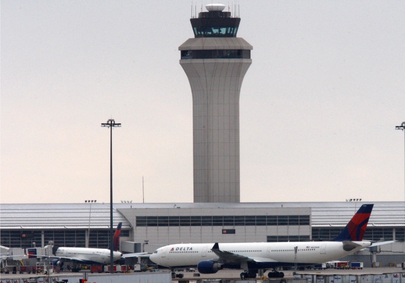 Jets are shown outside Detroit Metropolitan airport in this 2009 file photo. (AP Photo/Carlos Osorio)