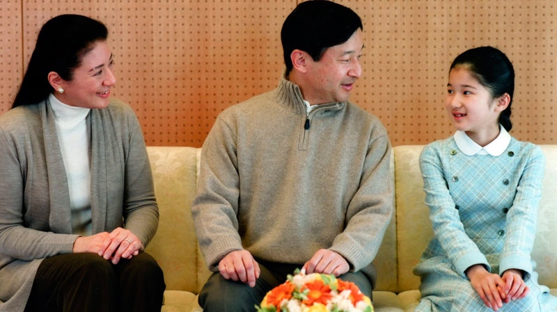 Japan's Crown Prince Naruhito poses with his wife Crown Princess Masako and their daughter Princess Aiko at the Togu Palace in Tokyo on  Feb. 13, 2011.(AP / Imperial Household Agency of Japan) 
