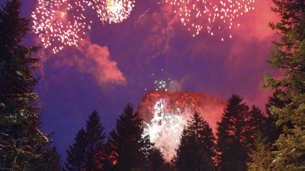 In this Korean Central News Agency photo released by Korea News Service in Tokyo, fireworks marking the 67th birthday of North Korean leader Kim Jong Il explode over Mount Paektu, his birthplace according to his official biography in North Korea, Thursday, Feb. 12, 2009. (AP Photo/Korean Central News Agency via Korea News Service)