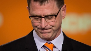 B.C. NDP Leader Adrian Dix pauses while addressing supporters after the Liberal Party was projected to win a majority government in Vancouver, B.C., on Tuesday May 14, 2013. THE CANADIAN PRESS/Darryl Dyck